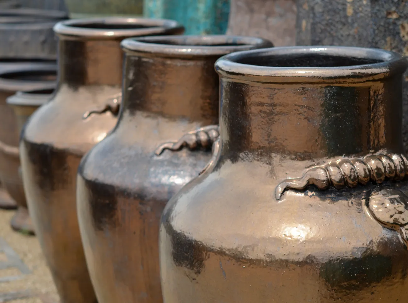 Shiny brown pottery jars